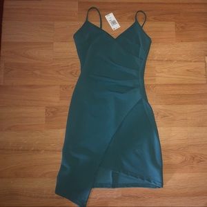 Teal a-symmetrical body-con dress